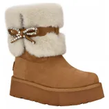A tan suede platform boot with white fur trim and a decorative bow featuring rhinestones.