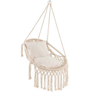 Hanging macramé chair with a cushioned seat, featuring a woven rope design and fringe detailing.