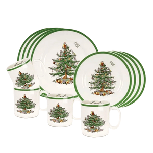 12-piece Spode Christmas Dinnerware Set includes plates and mugs featuring a festive Christmas tree design with a green border.