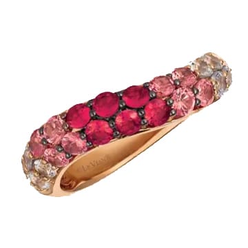 A ring with a gold band features rows of red, pink, and clear gemstones in a gradient pattern.