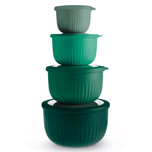 A stack of four green plastic bowl containers in varying shades, each with a lid, arranged in decreasing size order from bottom to top.