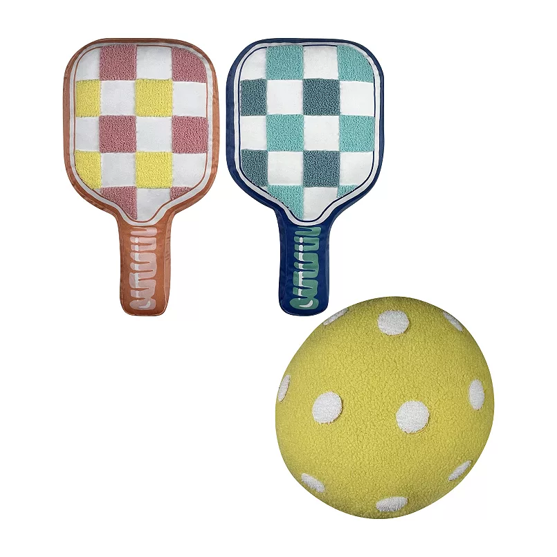 Two checkered paddles and a yellow ball with white polka dots, resembling pickleball equipment.