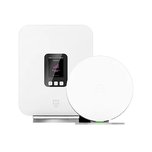 A white Wi-Fi router or network device with a digital display showing connection strength and a matching round accessory, possibly a satellite or extender, both featuring a minimalist design.