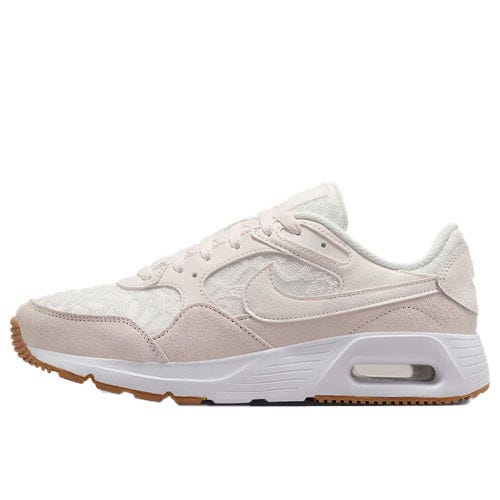 A white and beige athletic shoe with a visible air cushion in the heel and a gum sole, featuring a subtle swoosh logo on the side.