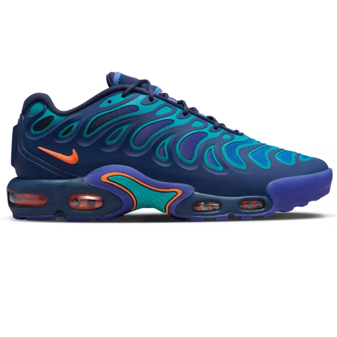Nike Men's Air Max Plus Drift Shoes feature a bold design with a dark blue base, teal accents, and orange highlights. The shoe includes distinctive wavy patterns and visible Air Max cushioning for comfort.