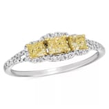 A ring featuring three yellow diamonds set in a row, accented by smaller white diamonds on a split shank band, crafted by Le Vian.
