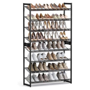 A shoe rack with eight shelves holds various types of footwear, including high heels, athletic shoes, and casual sneakers. The frame is black with a sturdy design.