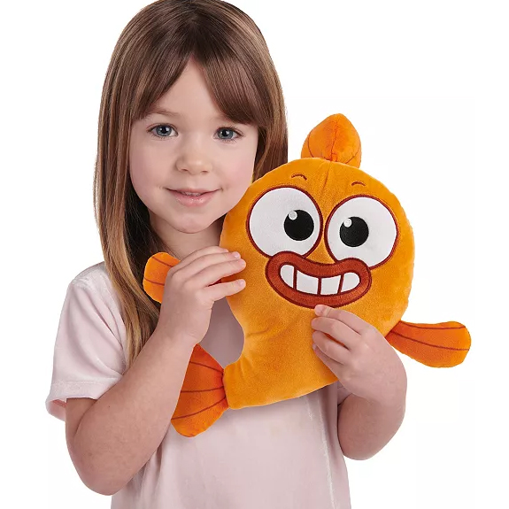 A 12-inch orange plush toy resembling a fish with large, expressive eyes and a big smile, held by a child in a light-colored shirt.