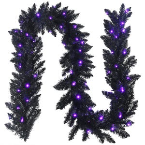 A black artificial garland with purple LED lights for decoration or holiday display.