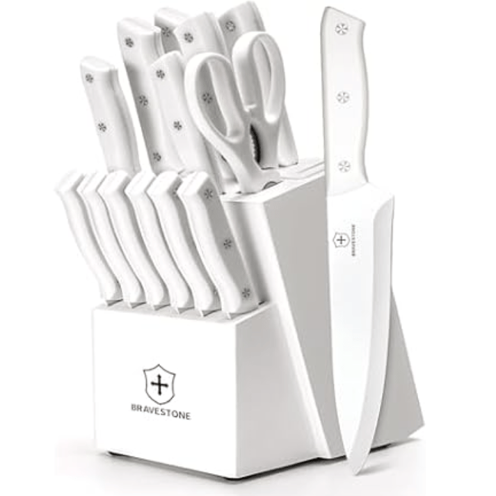 The Bravestone Knife Set includes a white block with multiple knives, featuring smooth white handles and floral-like impressions. It also includes kitchen scissors, all organized neatly in the block with a sleek, minimalist design.