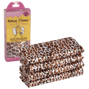 Satin pillowcases with a leopard print design are displayed, alongside packaging labeled \“Morning Glamour.\“