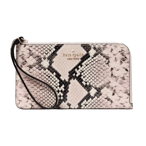 Kate Spade New York Snake Wristlet features a snakeskin pattern with a detachable strap and gold logo lettering.