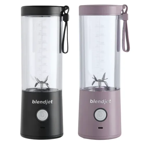 Two portable blenders, one black and one lavender, featuring a cylindrical design, a blending blade inside, and a carrying strap.