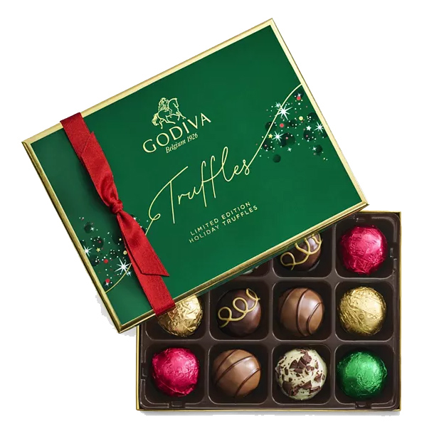 The 12-piece Godiva Holiday Truffle Gift Box features assorted chocolate truffles in vibrant red, gold, and green foil wrapping in a festive green box with a red ribbon. It is labeled as limited edition holiday truffles.