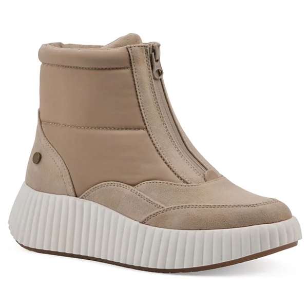 Beige ankle boot with a central front zipper, suede accents, and a thick ribbed white platform sole.