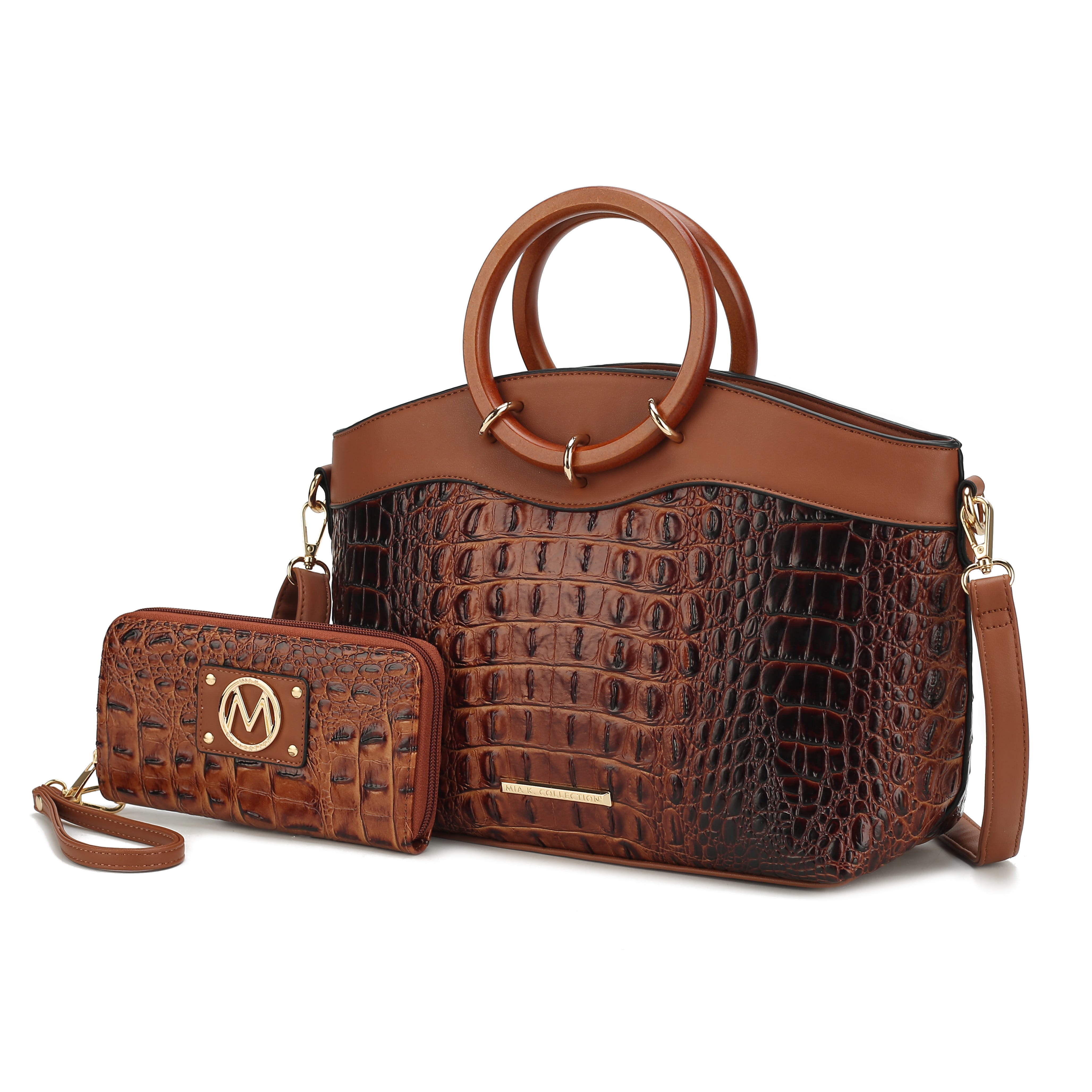 A brown embossed handbag with circular handles and a detachable strap, accompanied by a matching wallet featuring a gold emblem.