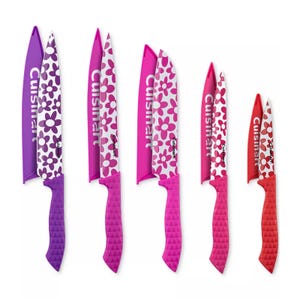 The 10-piece Cuisinart Cutlery Set features five multicolored knives with floral designs and matching blade guards. Each knife has a textured handle in shades of purple, pink, fuchsia, and red.