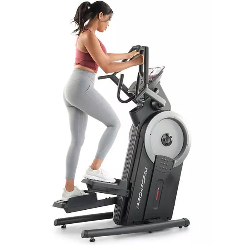The ProForm Elliptical Trainer HI is a fitness machine designed for cardio workouts, with a compact, vertical-oriented frame, dual handlebars, and a digital console for monitoring progress.