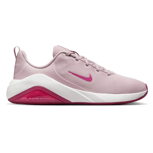 A pink Nike Air Zoom sneaker with a white midsole and magenta details, featuring a lightweight mesh upper and lace-up closure.
