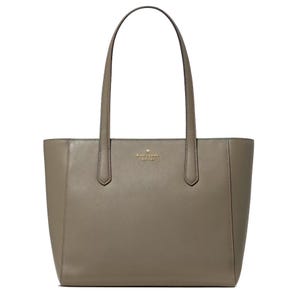 A taupe Kate Spade New York tote bag with dual handles and a saffiano leather finish.