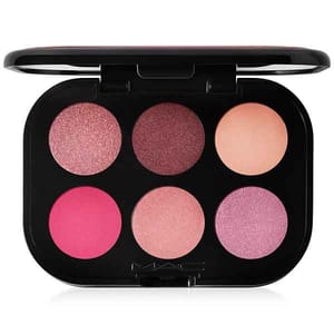 An eyeshadow palette featuring six shades in pink and peach tones, housed in a black compact.