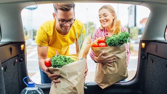 man and woman buying generic groceries
