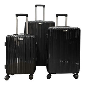 Three black hard-shell suitcases of varying sizes with retractable handles and four wheels.