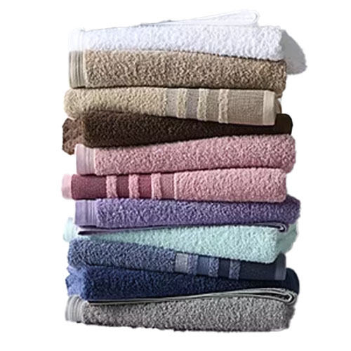 A stack of multi-colored bath towels, including white, beige, brown, pink, purple, blue, and gray, neatly arranged in layers.