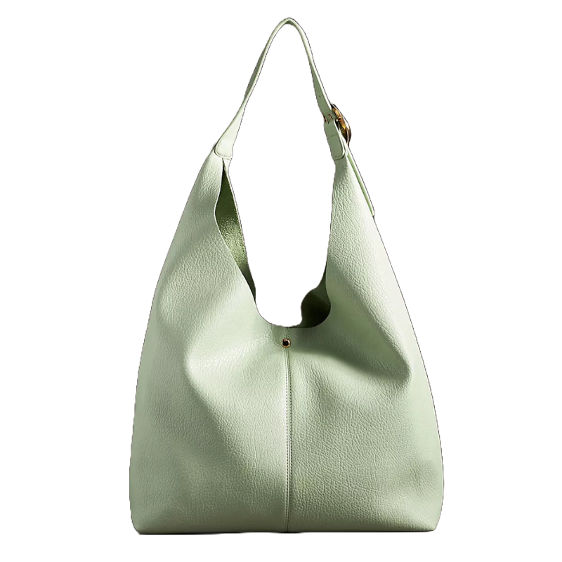A mint green slouchy bag with a soft, pebbled texture, featuring a single shoulder strap and a gold-tone accent at the top center.