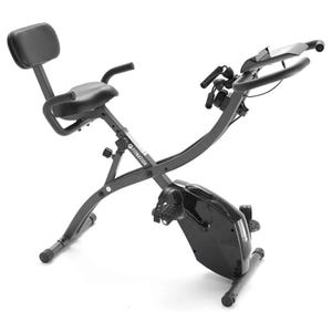 A foldable exercise bike with a padded backrest, adjustable seat, and handlebar grips, featuring a compact design with a digital display and pedal straps for indoor workouts.