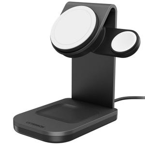 The OtterBox MagSafe Charging Station is a sleek, black stand with three charging areas: a main MagSafe mount for phones, a smaller pad for AirPods, and a side mount for Apple Watch.