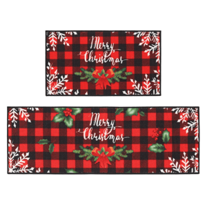 Two rectangular, red and black plaid mats featuring \“Merry Christmas\“ text, adorned with snowflakes and festive greenery accents.