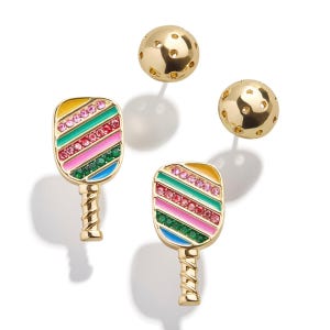 Gold pickleball-themed earrings include circular studs and paddle designs with multicolored stripes and gemstones.