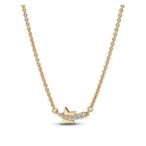 A gold necklace with a pendant shaped like a shooting star, some parts encrusted with crystals.