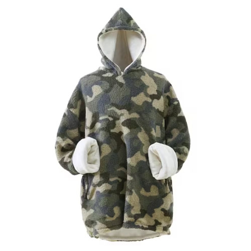 A hooded camouflage-patterned oversized fleece blanket hoodie with a soft white interior lining and large front pocket.