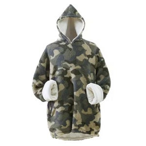A hooded camouflage-patterned oversized fleece blanket hoodie with a soft white interior lining and large front pocket.
