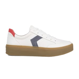 White low-top sneakers with a thick tan sole, featuring a navy lateral stripe and a red accent on the heel.