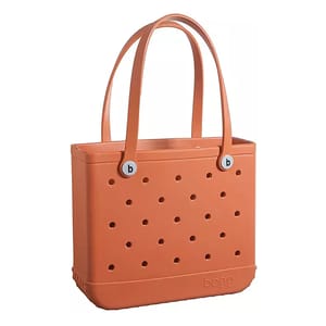 A rust-orange perforated tote bag with two handles and \“bogo\“ branding, designed for versatile use and easy carrying.