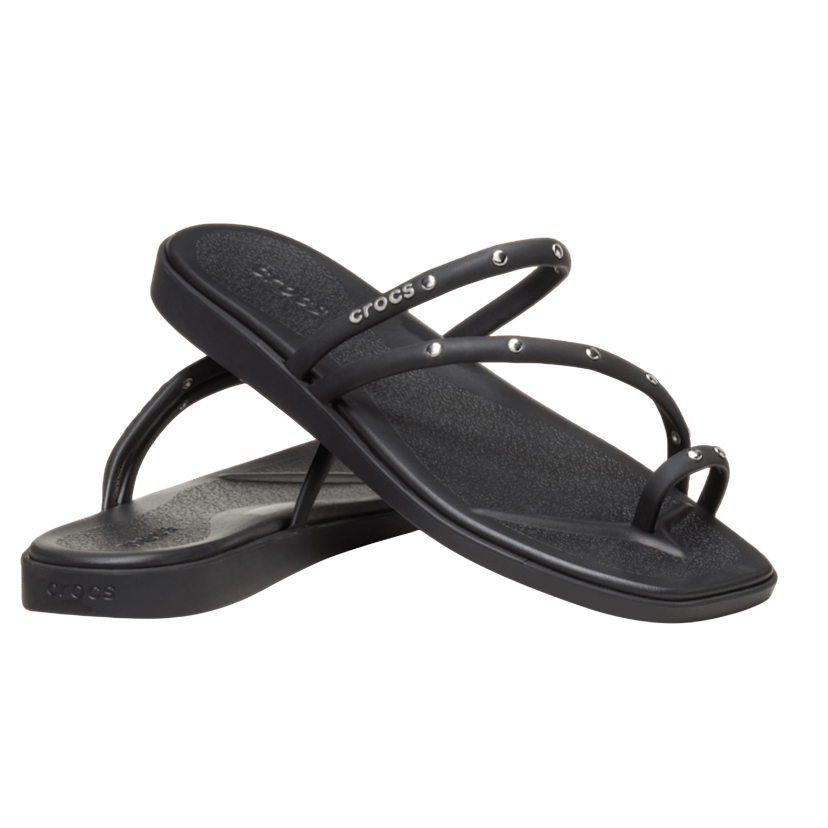 Black Crocs flip flops with strappy design and metal stud accents on the straps.