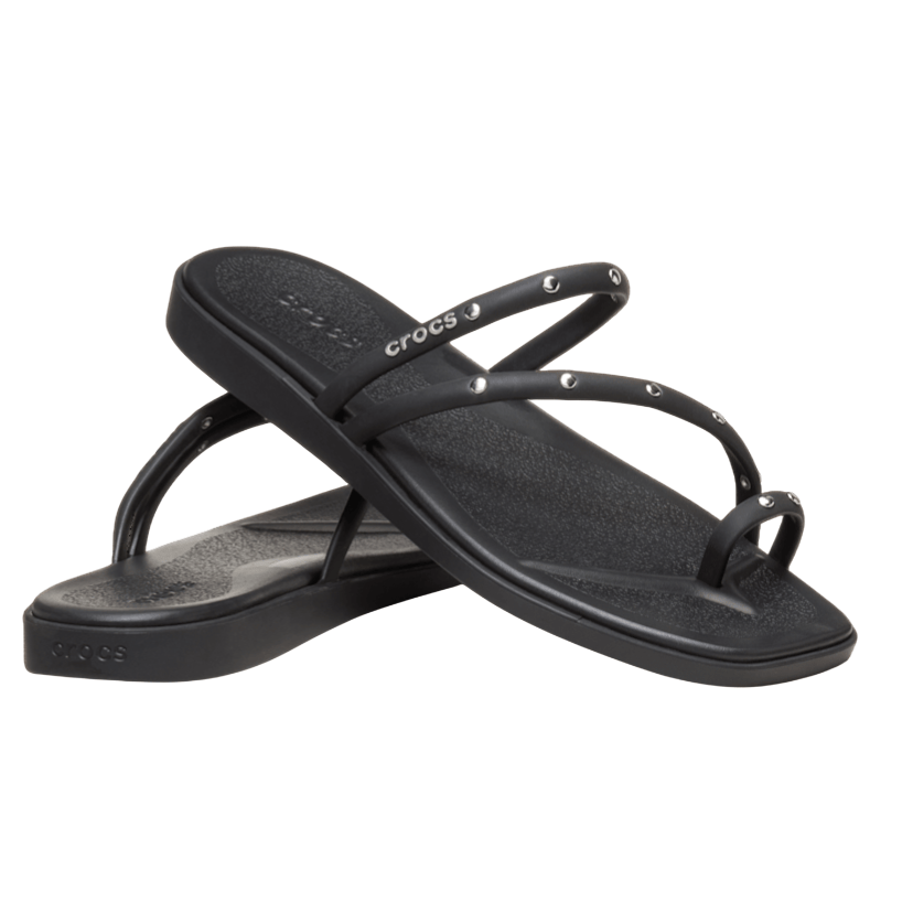 Black Crocs flip flops with strappy design and metal stud accents on the straps.
