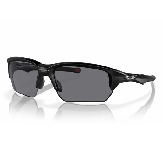 Black sports sunglasses with a sleek, half-rim design and dark lenses, featuring the Oakley logo on the temple.