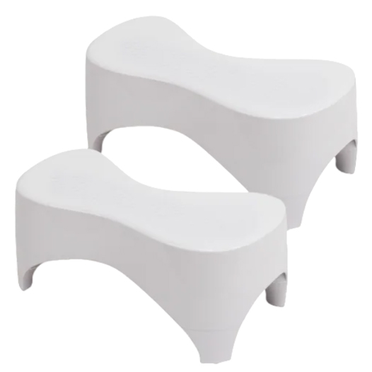 A pair of white, ergonomic toilet stools designed to promote proper posture by elevating the feet during use, enhancing comfort and function.
