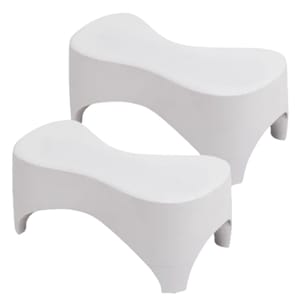 A pair of white, ergonomic toilet stools designed to promote proper posture by elevating the feet during use, enhancing comfort and function.