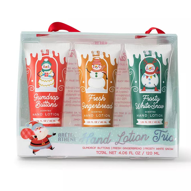 Hand Lotion Trio set featuring three 1.35 fl oz scented lotions: Gumdrop Buttons, Fresh Gingerbread, and Frosty White Snow. Each tube is decorated with festive snowman designs and comes in a clear package with a red ribbon. Total net weight: 4.06 fl oz / 120 ml.