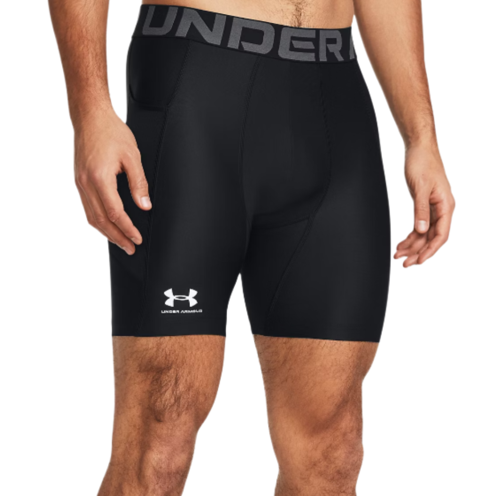 Black Under Armour compression shorts with a visible brand logo on the left thigh and \“Under Armour\“ text on the waistband.