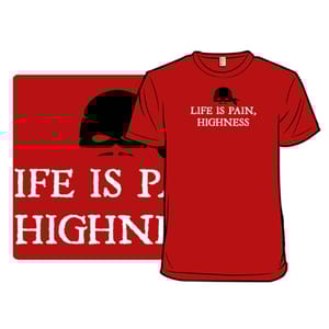 Red t-shirt with the phrase \“LIFE IS PAIN, HIGHNESS\“ in white text, featuring a black silhouette of a mask above the text.