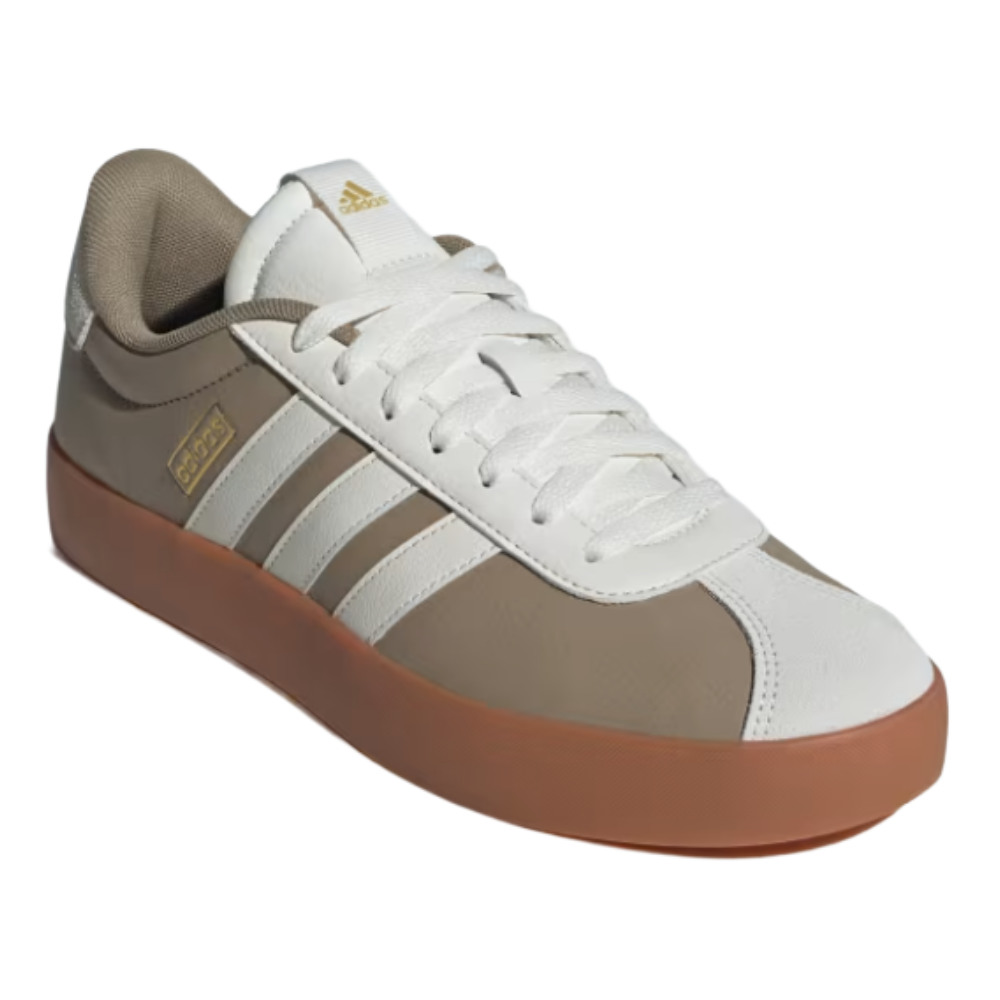 Adidas sneaker with white and beige upper, featuring the iconic three stripes and a gum sole.
