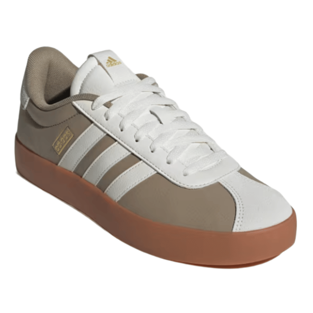 Adidas sneaker with white and beige upper, featuring the iconic three stripes and a gum sole.