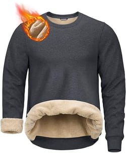 A dark gray fleece-lined sweatshirt with beige sherpa lining, featuring a flaming basketball graphic in the corner.