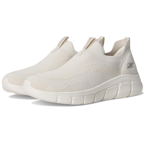 Skechers Bobs B Flex Shoes feature a slip-on design with a knit upper, light beige color, and a cushioned sole for comfort. They have the Skechers logo on the side, offering a casual and breathable fit.